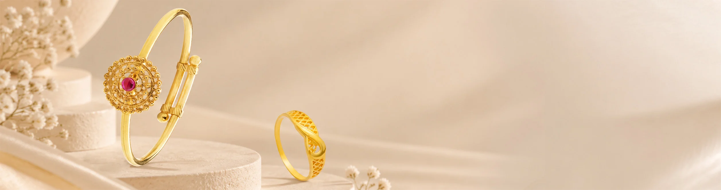 Models showcasing gold jewelry